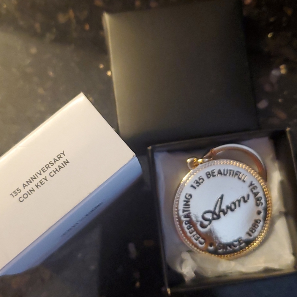 Avon rep pins and bracelet and key chain